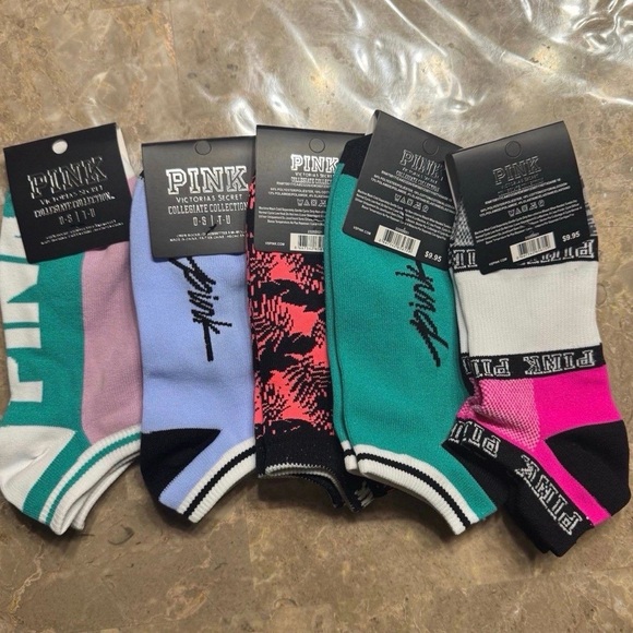 New Pink Victoria’s Secret Socks
With tags 
New Pink socks 
5 pairs included - Picture 2 of 3